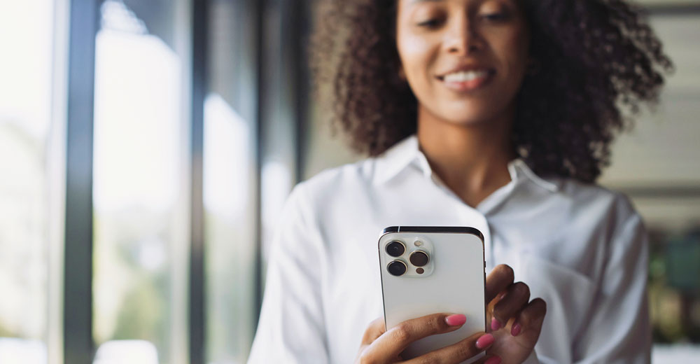 person using an iPhone